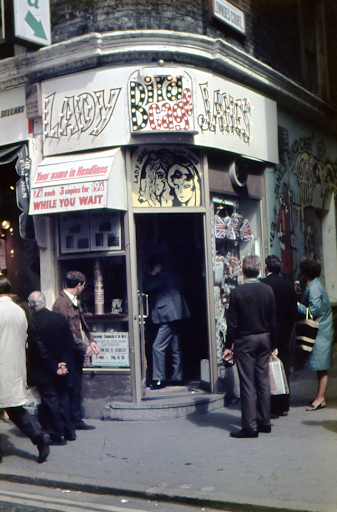 Vello Asi [man with a camera]  in London, 1968. Photo by Tadas Baginskas. Courtesy of Tadas Baginskas.
